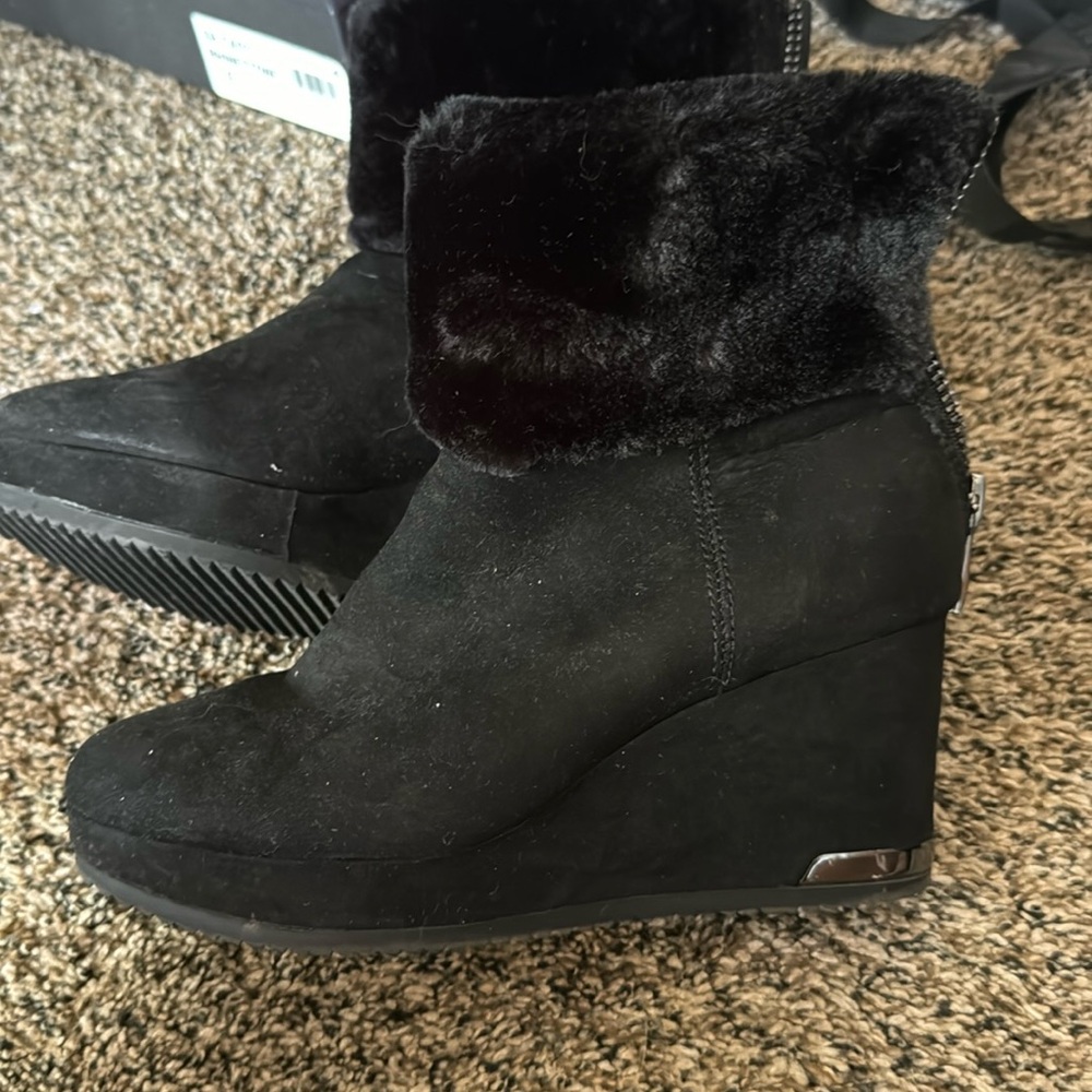 size seven women’s DKNY fuzzy fashion heeled boot